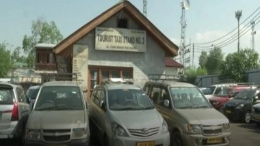 India News | Taxi Drivers Adversely Affected in J-K's Srinagar Amid COVID Lockdown