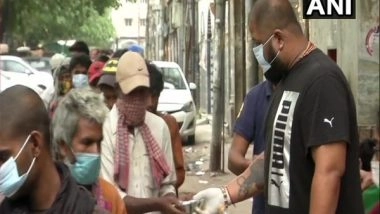 Sports News | COVID-19: Powerlifter Gaurav Sharma Hits Streets to Help Needy