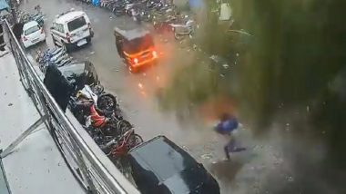 Mumbai: Narrow Escape for Woman as Giant Tree Falls on Street Amid Heavy Rains Due to Cyclone Tauktae (Watch Video)