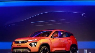 Business News | Tata Motors Q4 Net Loss Narrows to Rs 7,605 Crore