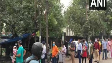 India News | Queues Outside COVID-19 Vaccination Centres in UP's Noida, Ghaziabad