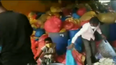 Madhya Pradesh: Viral Clip From Satna Purportedly Shows People Washing Used PPE Kits, Masks and Hand Gloves for Resale (Watch Video)