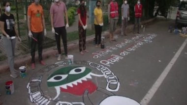 India News | Youngsters in J-K Paint Beautiful Graffiti on Road to Create COVID-19 Awareness