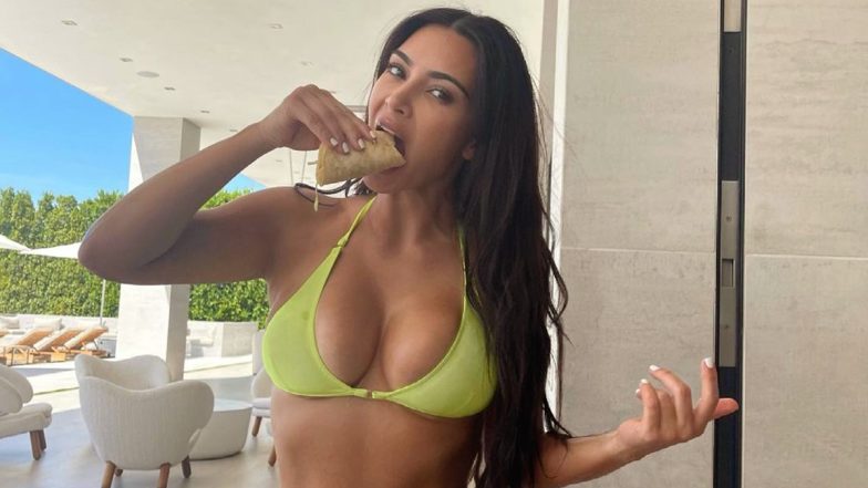 Kim Kardashian Is a Sight to Behold in This Neon Bikini (See Pic)