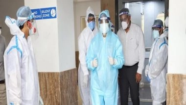 India News | Dharmendra Pradhan Visits Hospital in Odisha's Angul Wearing PPE Suit