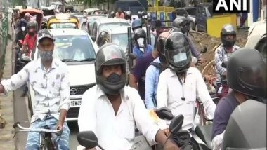 India News | After Ease in Lockdown, Heavy Traffic at Andhra-Telangana Border