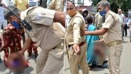 Meerut Policeman Seen Holding Baby in Objectionable Manner While Mediating Between 2 Groups, Probe Ordered After Images Go Viral