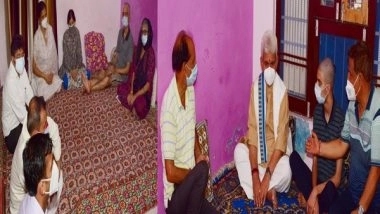 India News | J-K: Lt Governor Manoj Sinha Visits Family of Councillor Rakesh Pandita, Who Was Killed in Terrorist Attack