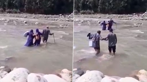 Jammu and Kashmir: Health Workers Seen Crossing River To Reach Remote Area of Kandi Block in Rajouri To Conduct COVID-19 Vaccination Drive (Watch Video)