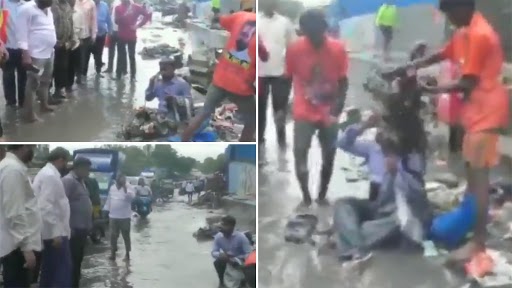 Dilip Lande, Shiv Sena MLA From Chandivali, Makes Contractor Sit on Waterlogged Road; Tells Workers To Dump Garbage on Him (Watch Video)