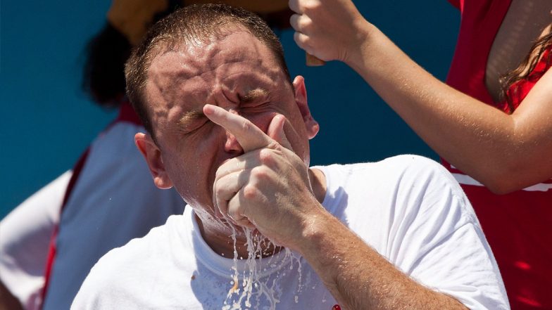 Joey Chestnut Sets World Record; Gobbles Down 76 Hot Dogs in Just 10 Minutes at Nathan's 4th of July Contest 2021