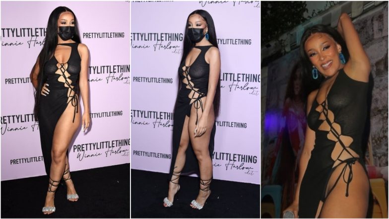 Doja Cat Ditches Bra but Not Mask From Her Most-Daring Look! View Pics of ‘Kiss Me More’ Singer in Lace-Up Cutout Dress With Bikini Bottom