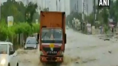 India News | Waterlogging Hits Vehicular Movement in Gurugram, Noida, Delhi