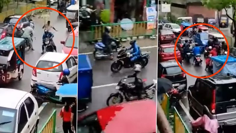 Assam: Policeman With Umbrella in Hand Chases Biker at RNB Road in Kokrajhar, Video Goes Viral