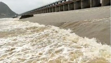 India News | Andhra Pradesh: Krishna Waters Released into Sea by Lifting Prakasam Barrage Gates