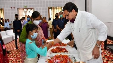 India News | Uttarakhand CM Celebrates Raksha Bandhan with Children, Women from Nari Niketan