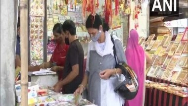India News | COVID-19: Low Customer Footfall Worries Rakhi Sellers in Jaipur