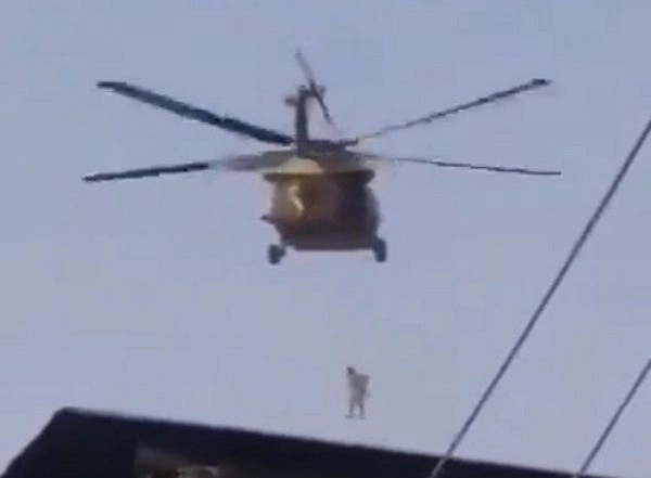 World News | Post US Exit from Afghanistan, Video Surfaces of Taliban Flying US Chopper with Man Dangling from Rope