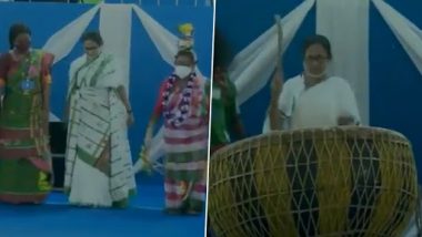 Mamata Banerjee Spotted Dancing, Playing Drum at Event Organised To Mark World Tribal Day 2021 in West Bengal’s Jhargram (Watch Video)