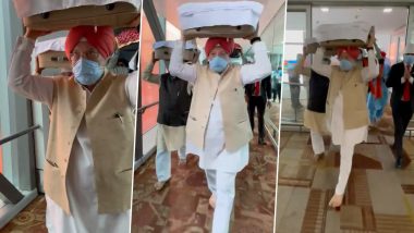 Hardeep Singh Puri Carries Shri Guru Granth Sahib, Flown From Kabul, At Delhi Airport (Watch Video)