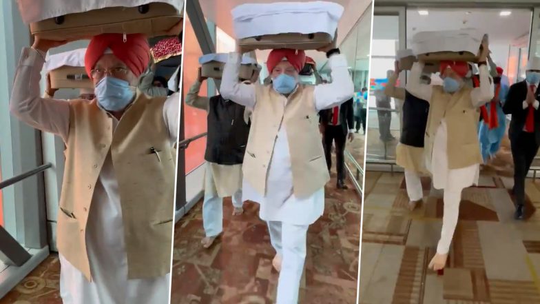 Hardeep Singh Puri Carries Shri Guru Granth Sahib, Flown From Kabul, At Delhi Airport (Watch Video)