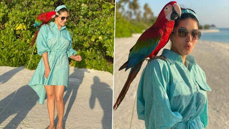 Sunny Leone Looks Pretty In a Powder Blue Flared Shirt Dress, Shares Stunning Pics With a 'Naughty Macaw' From Her Maldives Vacay (See Photos)