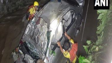 India News | Car with Two Passengers Falls into Drain Following Heavy Rainfall in Dehradun