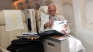 World News | PM Modi Goes Through Papers, File Work During His Journey to US