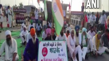 India News | Bharat Bandh: Farmers Block Highways, Squat on Rail Tracks; Traffic Hit on Delhi, Haryana Borders