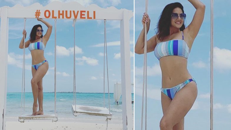 Sunny Leone Enjoys Swing Time In a Sexy Blue Striped Bikini, Shares Enticing Snap From Maldives Vacation