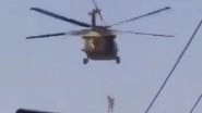 World News | Afghan Journalists Say Man Seen Hanging from Helicopter a Flag Installer, Wasn't Dead