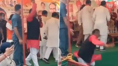 BJP Leader Jagdish Jaiswal Falls From Stage While Speaking Soon After MP CM Shivraj Singh Chouhan Takes Centrestage in Khargone (Watch Video)