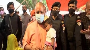 India News | Adityanath Meets Flood Victims, Distributes Relief Material in UP's Siddharthnagar