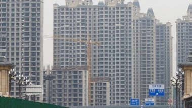World News | After Evergrande, Another Chinese Real Estate Developer Modern Land Struggling to Pay Its Debts