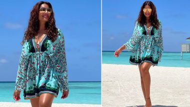 Bipasha Basu Enjoys the White Maldivian Sand in a Blue Floral Mini Dress (View Pics)