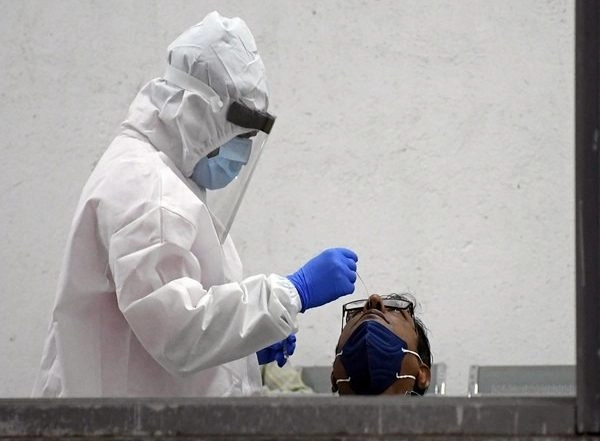 World News | Malaysia Reports 8,743 New COVID-19 Infections, 74 New Deaths