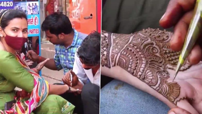 Karwa Chauth 2021 Mehendi: Women Throng Market for Mehndi in Gurugram A Day Before The Festival (See Pics)