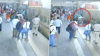 RPF Personnel Saves Woman From Falling Under Moving Train (Watch Video)