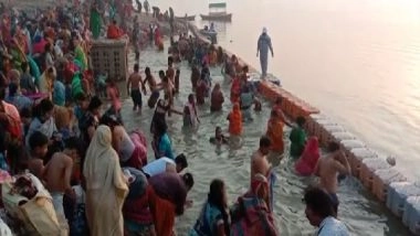 India News | Prayagraj: Devotees Take Holy Dip in River Yamuna on Bhai Dooj