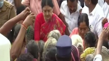 India News | Chennai: Sasikala Distributes Relief Material in Rain-affected Areas