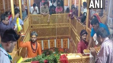 India News | UP: Devotees Offer Prayers at Lete Hanuman Mandir on the Occasion of Hanuman Jayanti in Prayagraj