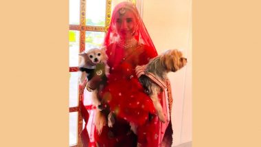 Rajkummar Rao and Patralekhaa Wedding: Bride in Full Red Veil Is a Stunner As She Happily Captures the Moment With Tiny Doggies (View Viral Pic)