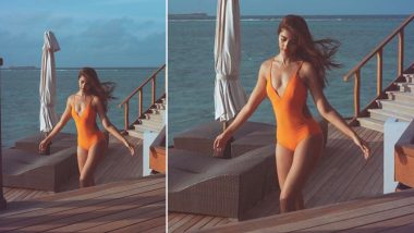 Pooja Hegde Is a Sight To Behold As She Flaunts Her Toned Body in Sexy Orange Monokini in Maldives! (View Pic)