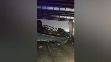 India News | Trailer with Container Falls from Road Overbridge in Maharashtra's Jasai-Dapoli Goods Line Section