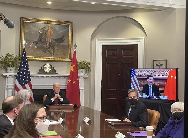 World News | Biden Expresses Concerns to Xi over Human Rights Situation in Xinjiang, Tibet, Hong Kong
