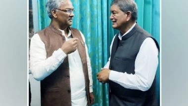 India News | BJP Leader Trivendra Singh Rawat Meets Cong's Harish Rawat in Dehradun