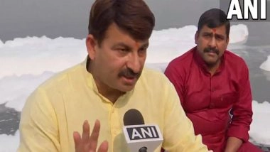 India News | BJP's Manoj Tiwari Rides Boat in Toxic Foam-covered Yamuna in Delhi