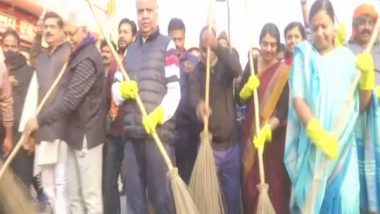 India News | BJP Conducts Cleanliness Campaign in Varanasi Ahead of Inauguration of Kashi Vishwanath Dham Corridor