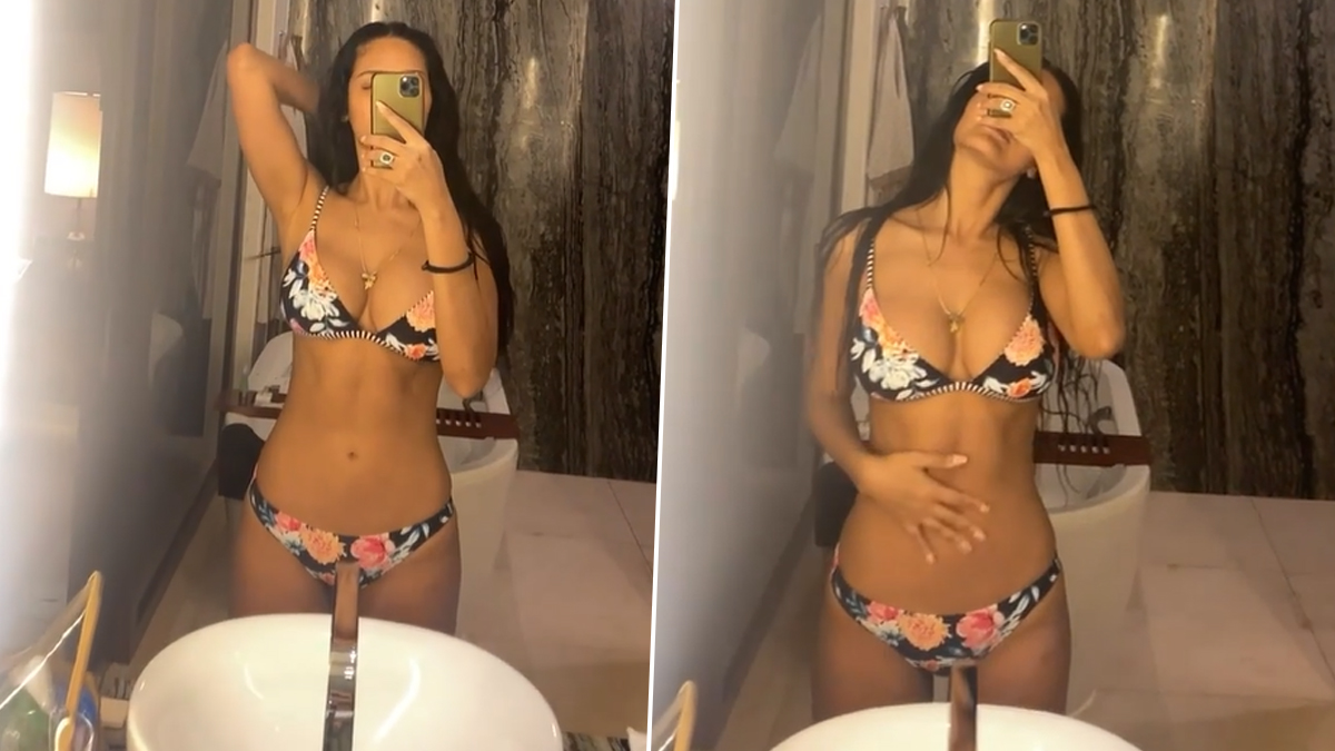 Esha Gupta Flaunts Her Sexy Body in a Black Floral-Printed Bikini and It's  Too Hot to Handle! (Watch Video) | ðŸ‘— LatestLY