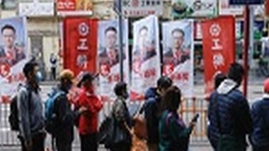 World News | Hong Kong Leader Casts Ballot in First Parliamentary Vote Since Electoral Reform: Reports